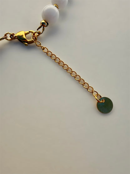 SOLSTICE - Collier de perles et soleils dorés